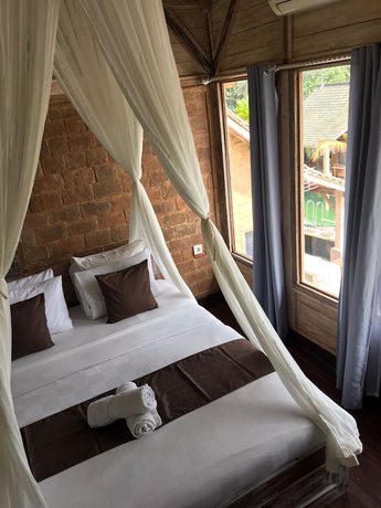 Imagen de la habitación del Hotel Ananda JJ Ubud Resort and Spa. Foto 6