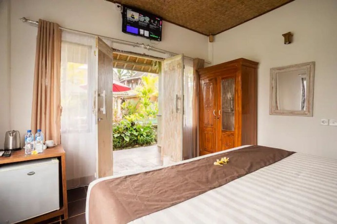 Imagen de la habitación del Hotel Ananda JJ Ubud Resort and Spa. Foto 9
