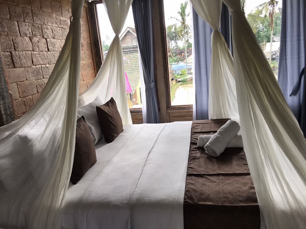 Imagen de la habitación del Hotel Ananda JJ Ubud Resort and Spa. Foto 10