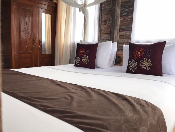 Imagen de la habitación del Hotel Ananda JJ Ubud Resort and Spa. Foto 17