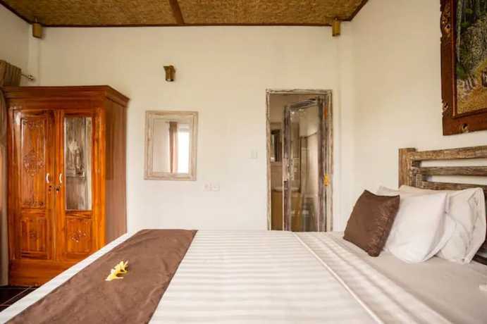 Imagen de la habitación del Hotel Ananda JJ Ubud Resort and Spa. Foto 19