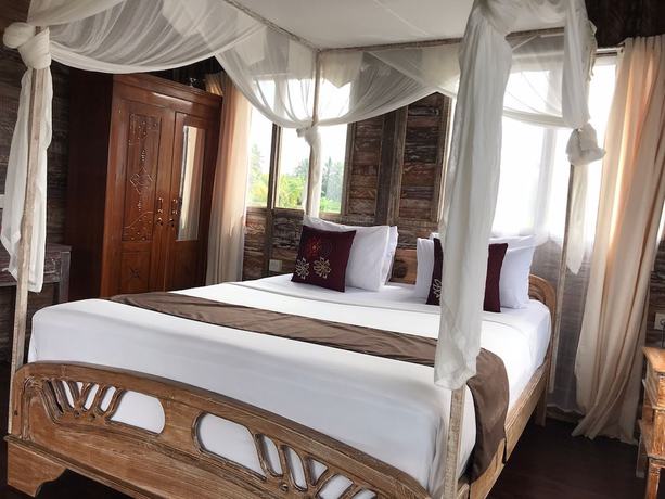 Imagen de la habitación del Hotel Ananda JJ Ubud Resort and Spa. Foto 20