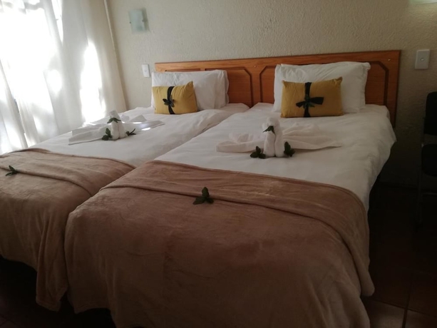 Imagen de la habitación del Hotel Ananda Lodge. Foto 10