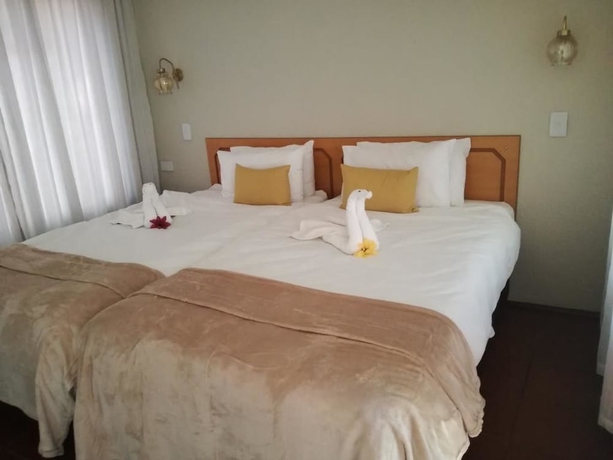 Imagen de la habitación del Hotel Ananda Lodge. Foto 11