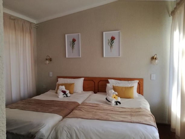 Imagen de la habitación del Hotel Ananda Lodge. Foto 12