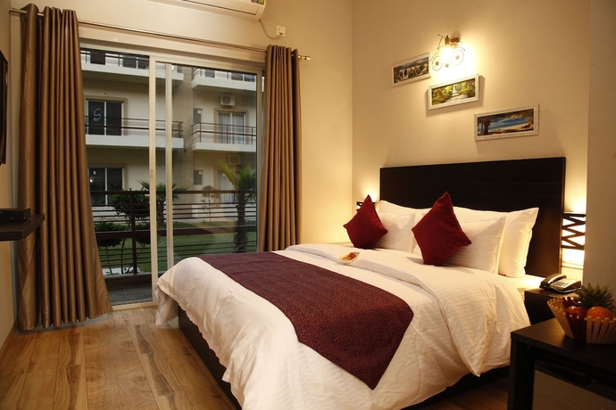 Imagen de la habitación del Hotel Anandam Clarks Inn Suites Vrindavan. Foto 8
