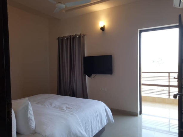 Imagen de la habitación del Hotel Anandam Clarks Inn Suites Vrindavan. Foto 11