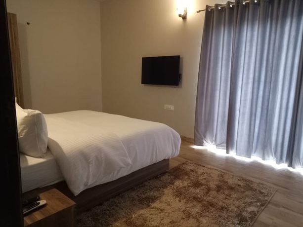 Imagen de la habitación del Hotel Anandam Clarks Inn Suites Vrindavan. Foto 16