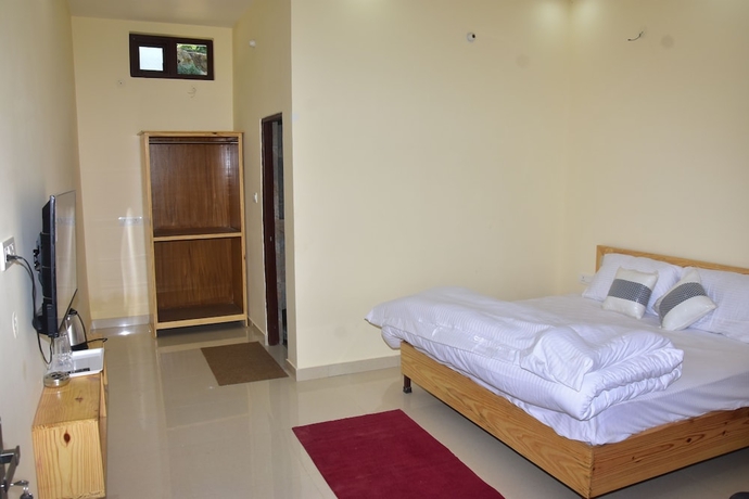 Imagen de la habitación del Hotel Anandam Phata. Foto 9