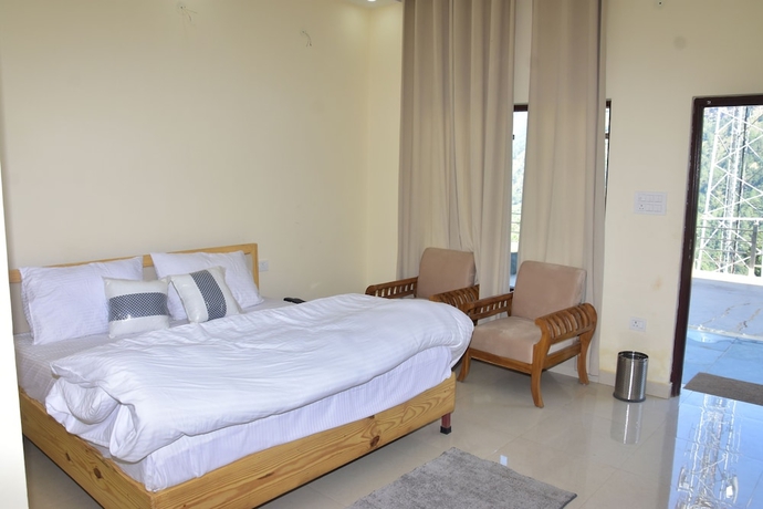 Imagen de la habitación del Hotel Anandam Phata. Foto 11