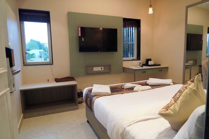 Imagen de la habitación del Hotel Anant Inn. Foto 10