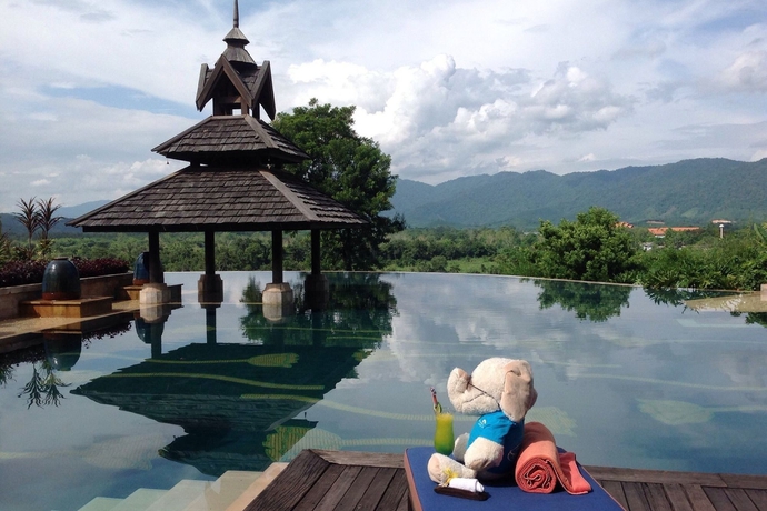 Imagen de la piscina del Hotel Anantara Golden Triangle Elephant Camp and Resort. Foto 15