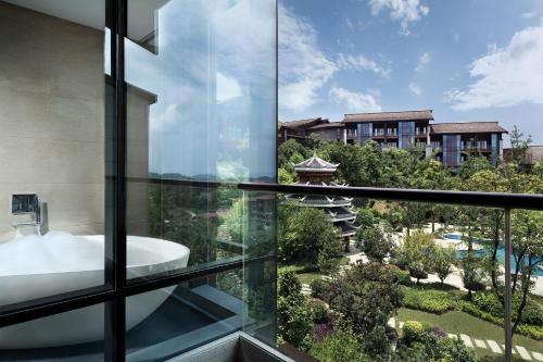 Imagen de la habitación del Hotel Anantara Guiyang Resort. Foto 4