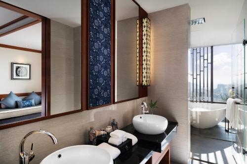 Imagen de la habitación del Hotel Anantara Guiyang Resort. Foto 7
