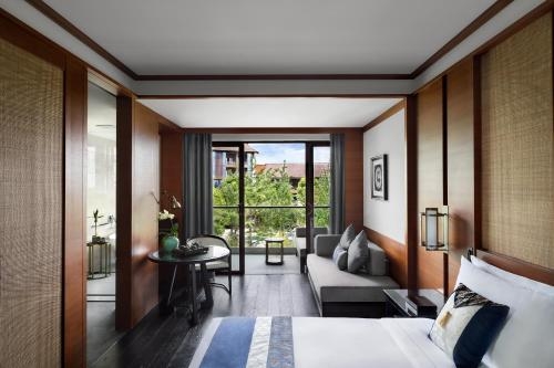 Imagen de la habitación del Hotel Anantara Guiyang Resort. Foto 9