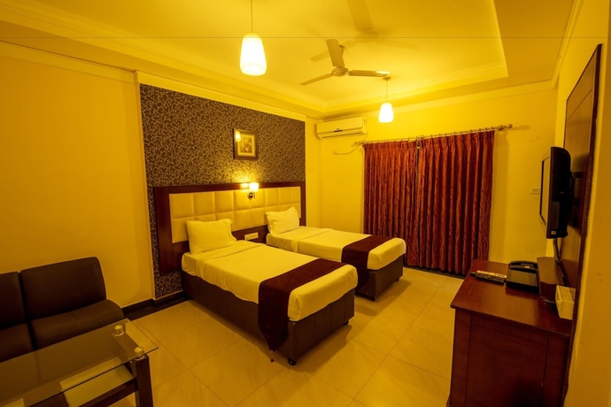 Imagen de la habitación del Hotel Ananya Comfortss. Foto 5