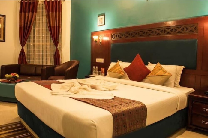 Imagen de la habitación del Hotel Ananya Greens. Foto 8