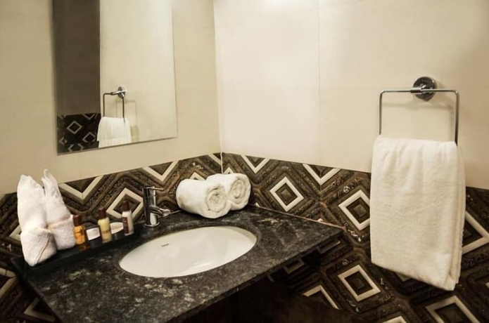 Imagen de la habitación del Hotel Ananya Greens. Foto 12