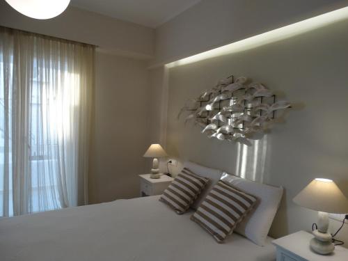 Imagen de la habitación del Hotel Anassa Suites. Foto 12