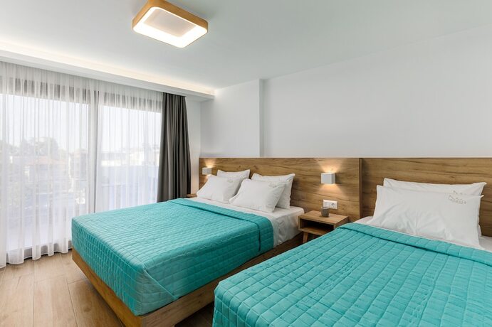 Imagen de la habitación del Hotel Anassa Suites. Foto 13
