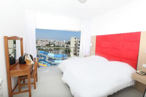 Imagen de la habitación del Hotel Anastasia Splash Residences. Foto 19