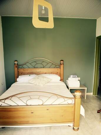Imagen de la habitación del Hotel Anastasios Olive Garden Apartments. Foto 12