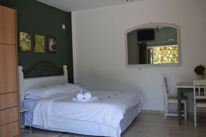Imagen de la habitación del Hotel Anastasios Olive Garden Apartments. Foto 17