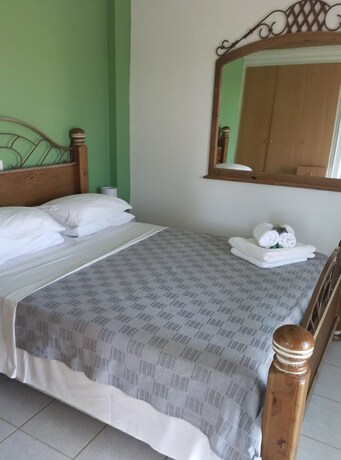 Imagen de la habitación del Hotel Anastasios Olive Garden Apartments. Foto 20