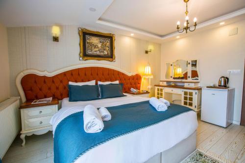 Imagen de la habitación del Hotel Anatolia, Ortahisar. Foto 17