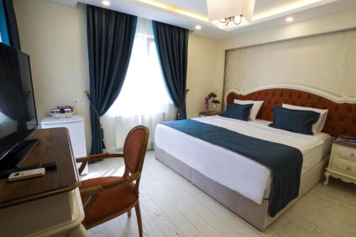 Imagen de la habitación del Hotel Anatolia, Ortahisar. Foto 18
