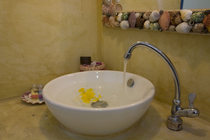 Imagen de la habitación del Hotel Anavilla Tangke Resort. Foto 8