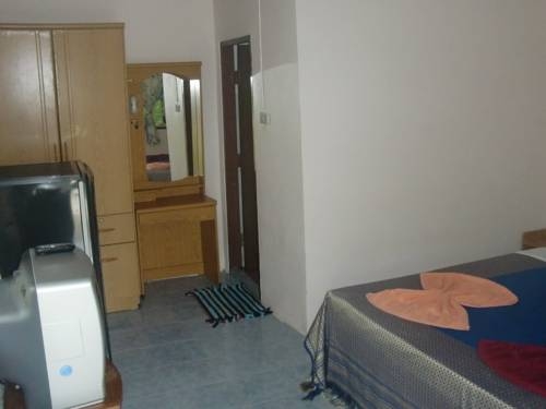 Imagen de la habitación del Hotel Anawin Bungalows. Foto 13