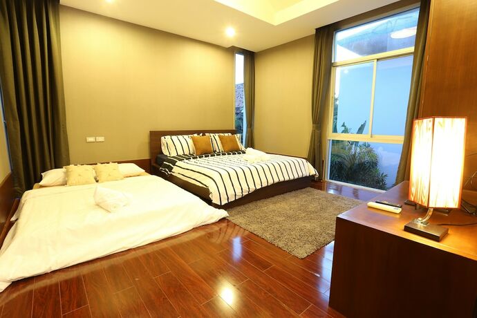Imagen de la habitación del Hotel Anb Pool Villa 3br Glass House In Pattaya. Foto 22