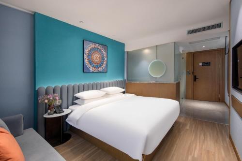 Imagen de la habitación del Hotel Anbo M Yiwu Wanda Plaza. Foto 16