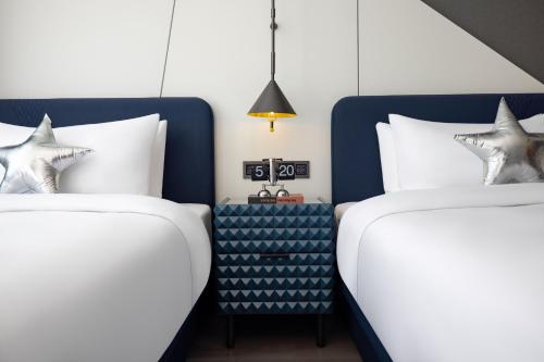 Imagen de la habitación del Hotel Anbo M Yiwu Wanda Plaza. Foto 18