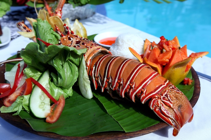 Imagen del bar/restaurante del Hotel Anchorage Beach Resort. Foto 2