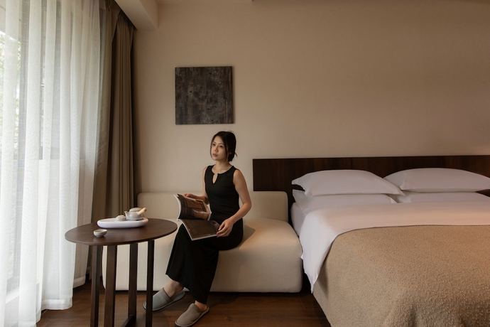 Imagen de la habitación del Hotel Ancient Charm Luxe Retreat Lijiang. Foto 5