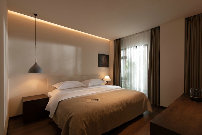 Imagen de la habitación del Hotel Ancient Charm Luxe Retreat Lijiang. Foto 9