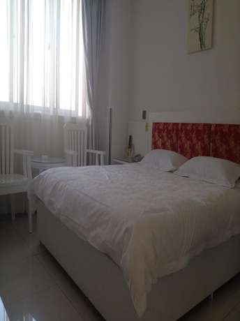 Imagen de la habitación del Hotel Ancient Culture Business Hotel. Foto 7