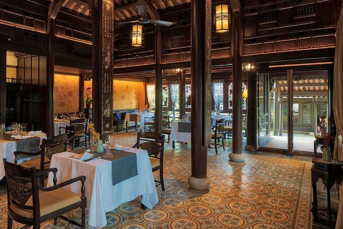 Imagen del bar/restaurante del Hotel Ancient Hue Garden Houses. Foto 8