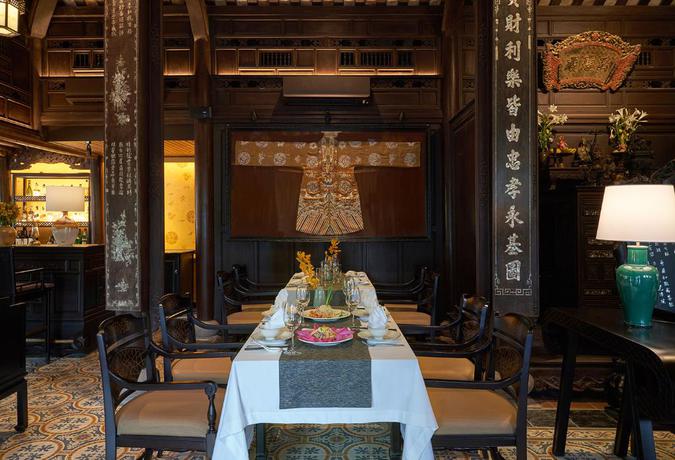 Imagen del bar/restaurante del Hotel Ancient Hue Garden Houses. Foto 9