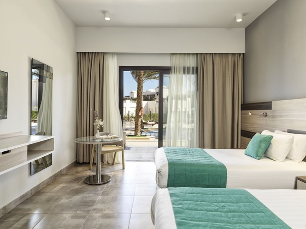 Imagen de la habitación del Hotel Ancient Sands Golf Resort and Residences. Foto 5