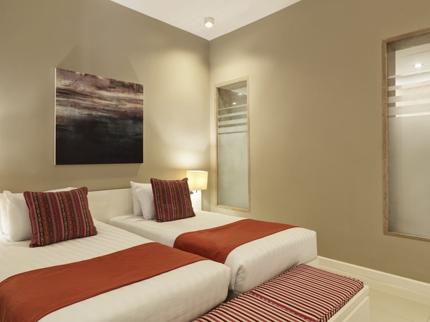 Imagen de la habitación del Hotel Ancient Sands Golf Resort and Residences. Foto 11