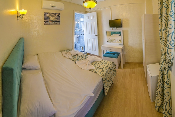 Imagen de la habitación del Hotel Ancient Town. Foto 6