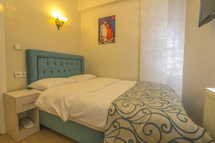 Imagen de la habitación del Hotel Ancient Town. Foto 8