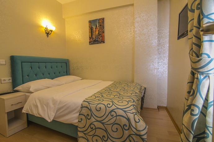 Imagen de la habitación del Hotel Ancient Town. Foto 9