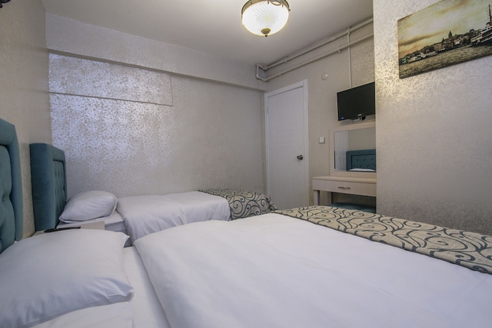 Imagen de la habitación del Hotel Ancient Town. Foto 10