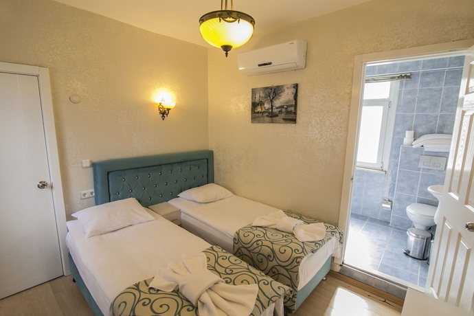 Imagen de la habitación del Hotel Ancient Town. Foto 11