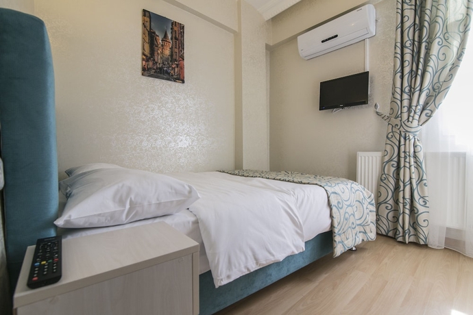 Imagen de la habitación del Hotel Ancient Town. Foto 12