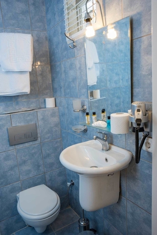 Imagen de la habitación del Hotel Ancient Town. Foto 18